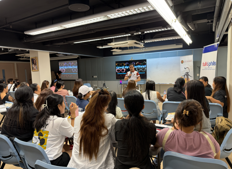 Asst. Prof. Raz Dela Torre facilitates the lecture-workshop for OFW participants in Hong Kong.